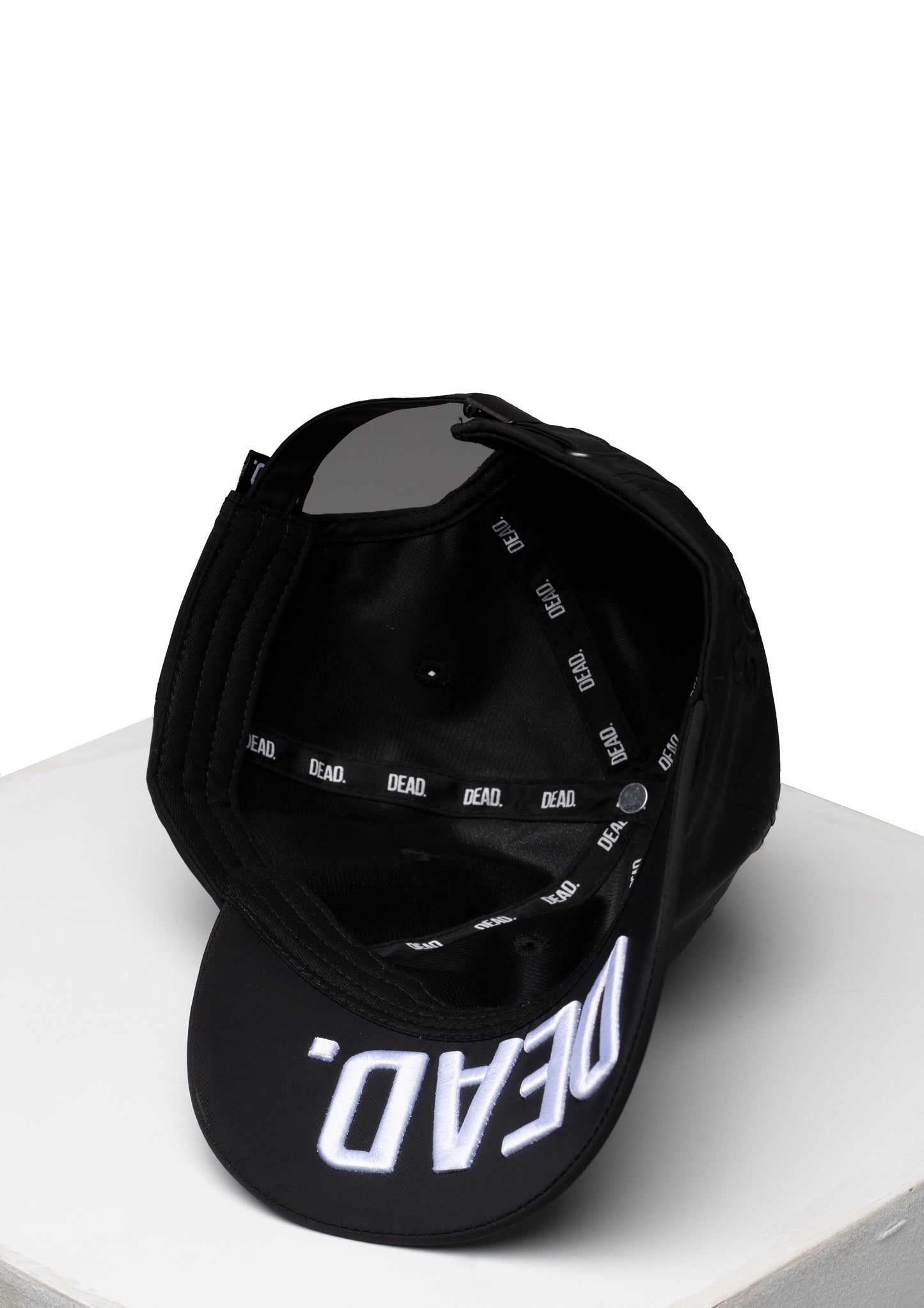 D. Logo Staple Cap